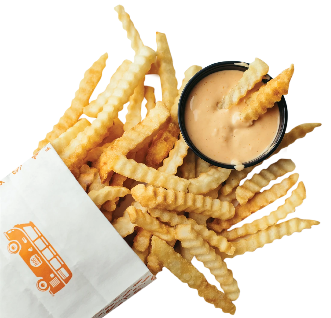 Fifty West crinkle-cut fries with a cup of fry sauce